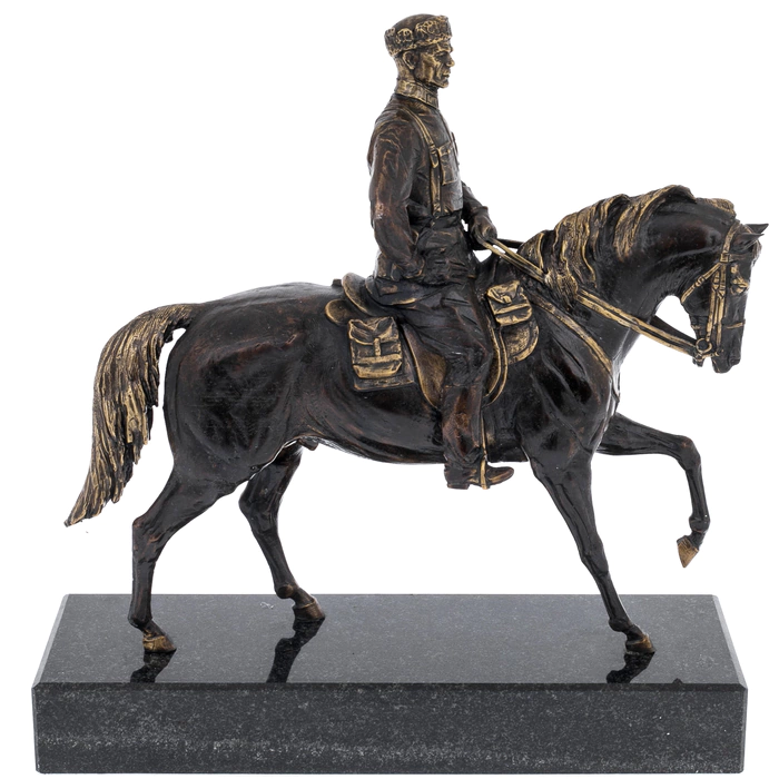 Brass and patina sculpture "General" on a granite stand