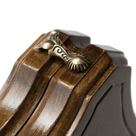 A small carved "Mountain Peaks" game set (chess, backgammon and checkers) with a handle