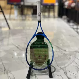 Tennis racket autographed by Novak Djokovic