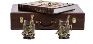 A set of cup holders "Wild Boars" and a book "Hunting"